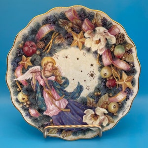 Lena Liu “Noel “ plate.  1996 Holiday Angels Bradford Exchange porcelain collector&#39;s plate.