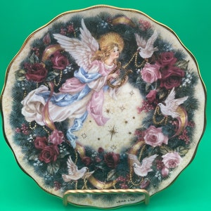 Lena Liu “Glad Tidings “ plate.  1996 Holiday Angels Bradford Exchange collector&#39;s plate.
