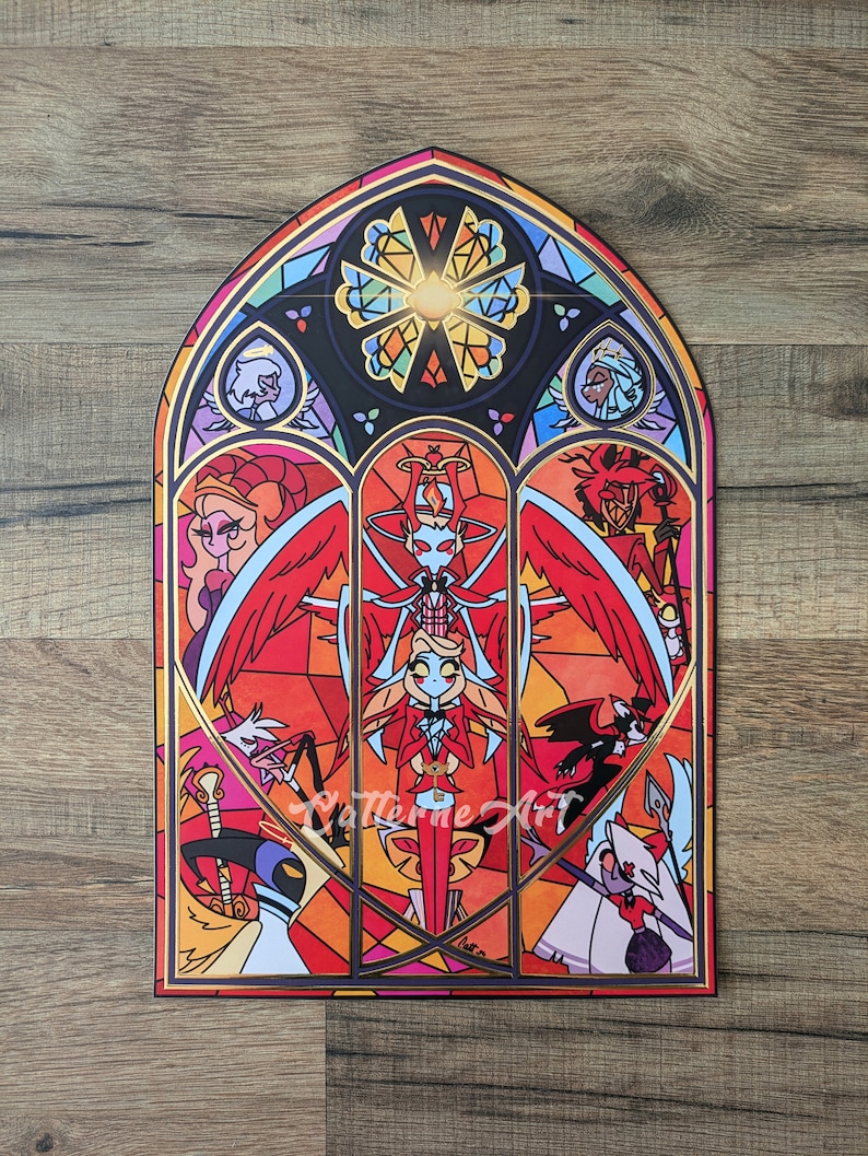May include: A stained glass window design featuring a red and white angel with wings spread wide. The angel is surrounded by other characters, including a red devil, a pink and white demon, and a white angel. The window is framed in gold.