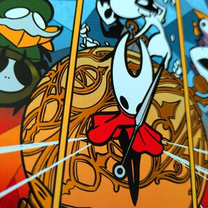May include: A vibrant illustration of characters from the video game Hollow Knight. The main character is a white-headed figure in a red cape, holding a needle-like weapon. The background is a stained-glass style design with orange, yellow, and blue tones.