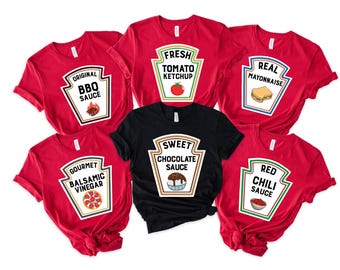 May include: Five red t-shirts and one black t-shirt featuring condiment bottle graphics. The prints include Original BBQ Sauce, Fresh Tomato Ketchup, Real Mayonnaise, Gourmet Balsamic Vinegar, Sweet Chocolate Sauce, and Red Chili Sauce with icons.