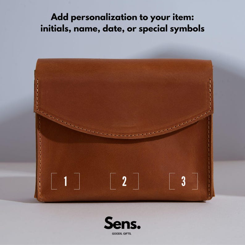 a brown leather wallet with numbers on it