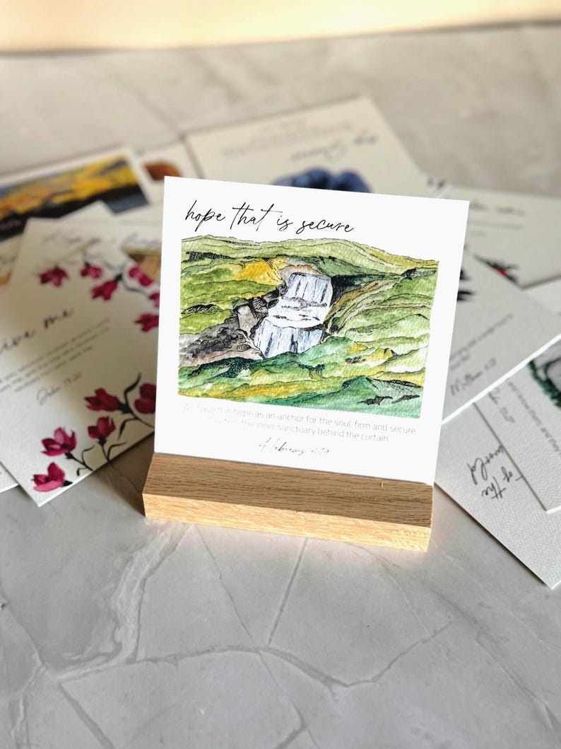 Memory Verse Scripture Card of "hope that is secure" and watercolor painting artwork, along with an oak wood display stand.