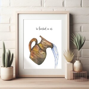 May include: A watercolor illustration of a brown clay jug pouring out blue water. The text "he lavished on us" is written in black cursive above the jug.