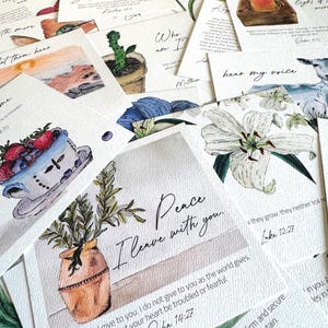 Several scripture cards in a pile.