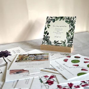 Memory Verse Scripture Card of Mark 10:57 and watercolor painting artwork, along with an oak wood display stand.