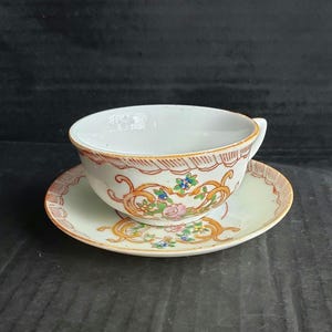 Vintage 3.5" Chinese Rose Medallion Famille Eggshell Porcelain Demitasse Cup and Saucer Set. Discontinued.