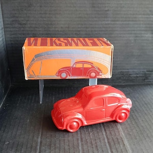 Vintage Avon Volkswagen Beatle Oland Aftershave Car Bottle 5". Full. Original Label. Original Box. Circa 1970's. Scratched. See Description.