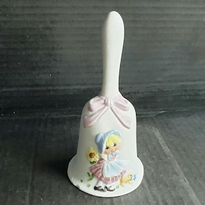 Vintage  5&quot; Jasco Bell. Girl with Bonnet. Original Label. Chip in Base.