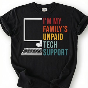 May include: Black t-shirt with the text "I'M MY FAMILY'S UNPAID TECH SUPPORT" in red, orange, yellow, and teal. A white computer monitor and keyboard graphic are on the left side of the shirt.