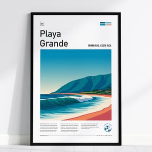 May include: A framed travel poster featuring a stylized illustration of Playa Grande in Tamarindo, Costa Rica. The artwork displays a blue ocean wave, a sandy beach, and mountains under a clear sky. Text includes the location name and coordinates.
