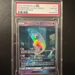 May include: A holographic Pokemon trading card featuring Mewtwo GX. The card is graded Gem Mint 10 by CGC Trading Cards. The card is from the Sword & Shield VSTAR Universe set. The card has a purple background with a holographic image of Mewtwo in the centre. The card has the text "Mewtwo GX" in the top left corner and "HP 190" in the top right corner. The card has three attacks: "Full Burst", "Super Absorption", and "Psystrike GX".