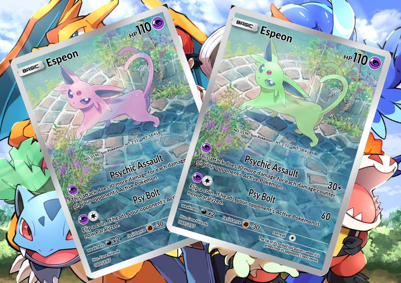 Puede incluir: Dos cartas de intercambio de Pok&eacute;mon con Espeon, un Pok&eacute;mon de tipo Ps&iacute;quico. Las cartas son ambas plateadas y azules con un fondo azul claro. El Pok&eacute;mon se representa en un esquema de color rosa claro y verde. Las cartas presentan el texto "Psychic Assault" y "Psy Bolt".
