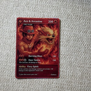 May include: A red trading card featuring Ace and Arcanine. Ace is shown with a hat and necklace, while Arcanine is a fiery, canine-like creature. The card includes text detailing abilities like "Burning Blast" and "Heat Tackle."