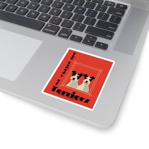 May include: A red sticker with a white border features a vintage-style illustration of two black and white terrier dogs. The text "The Comedy of Terriers" is written in black with a stylized font.
