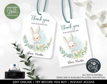 May include: Two printable thank you tags featuring a cute bunny rabbit with a blue bow tie. The tags are decorated with blue and green floral elements and the text "Thank you for hopping by!" and "Love, Hunter".