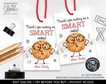 May include: Two printable gift tags featuring a cartoon cookie wearing glasses and the text "Thank's for making me a SMART cookie!" The tags are white with red and black text. The text "Love. Emily" is at the bottom of each tag.