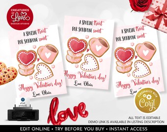 May include: Printable Valentine's Day card featuring a pink background with a heart-shaped cookie, a flower-shaped cookie, and a cup of coffee. The text on the card reads "A special treat for someone sweet. Happy Valentine's Day! Love, Olivia."