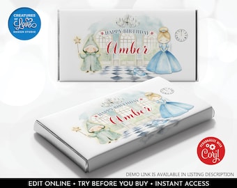 Könnte beinhalten: Zwei Schokoriegelverpackungen mit Prinzessinnen-Motiv. Eine Verpackung zeigt eine Fee und den Text "HAPPY BIRTHDAY Amber". Die andere Verpackung zeigt eine Prinzessin und denselben Text. Beide Verpackungen haben ein Aquarelldesign.