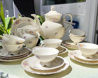 Tea and coffee service 1930 Zeh Scherzer anniversary rarity antique Art Deco porcelain. Ivory with floral pattern and gold rim.