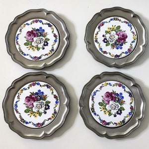 4 vintage pewter plates coasters porcelain with pewter fitting and flower decoration 10 cm