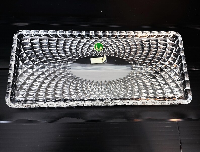 May include: A rustic wooden sign with the text "Welcome to our home" in a handwritten style. The sign features a distressed finish and a simple, inviting design, perfect for a front porch or entryway.