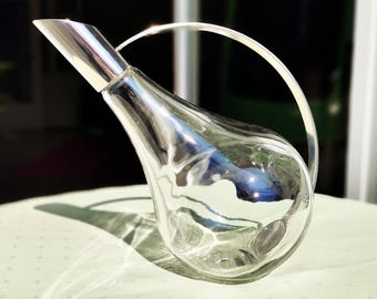 Vintage carafe with silver-colored metal fittings, elegant Italian decanter for red wine, retro kitchen bar decor