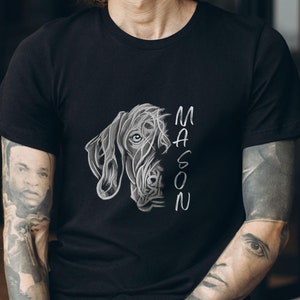 May include: Black t-shirt with a white graphic of a dog's head and the word "MASON" vertically down the side.