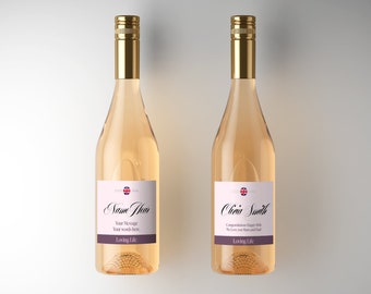 May include: Two bottles of rose wine with personalized labels. The labels are white with a pink border and feature a Union Jack flag. The first label reads "Name Here" with the text "Your message here" and "Loving Life". The second label reads "Olivia Smith" with the text "Congratulations Happy 18th! We Love you Mum and Dad" and "Loving Life".