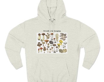 May include: A light grey hoodie featuring a graphic of various mushrooms and the text "I'd rather be foraging".