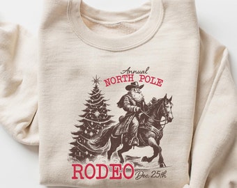 North Pole Rodeo T-Shirt, Cowboy Santa Tee, Horseback Santa Claus Gift, Funny Western Christmas Rodeo Country Tshirt, Retro Santa Rodeo Tee