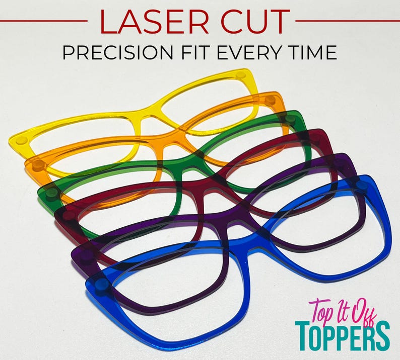 May include: A stack of colorful, laser-cut eyeglasses frames in yellow, orange, green, red, purple, and blue. The text "LASER CUT PRECISION FIT EVERY TIME" is at the top. The logo "Top it Off Toppers" is at the bottom.