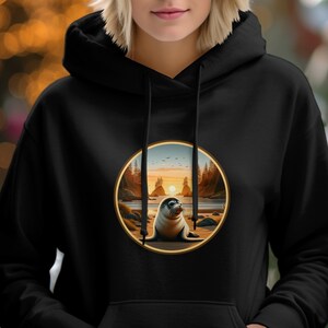 Baby Seal Golden Sunset - Available on Bella 3001 T-shirt, Gildan 18000 Crew Neck Sweater and Gildan 18500 Hoodie