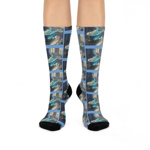 May include: A pair of blue and white socks with a repeating pattern of a bathtub filled with water. The socks are made of a soft, comfortable material and are ideal for everyday wear.