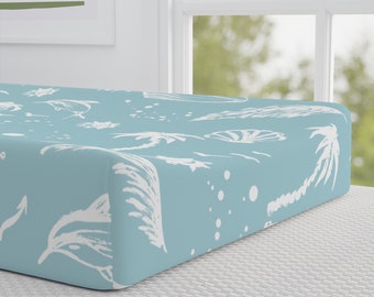 Housse de matelas à langer bleue et blanche pour chambre de bébé palmiers et dauphins