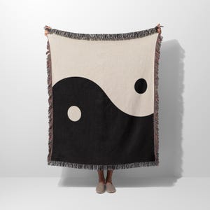 Minimalist Throw Blanket Yin Yang Design Black White Pattern Cotton Woven Material Tassel Edge Detail Contemporary Home Decor Zen Meditation Space Accent Urban Style Aesthetic Modern Living Room Essential Soft Comfortable Texture Year Round