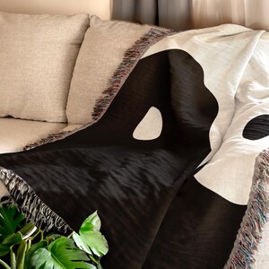 Cotton Woven Throw Yin Yang Design Black White Blanket Tassel Fringe Detail Handcrafted Quality Premium Material Soft Breathable Texture Meditation Space Accent Zen Room Decor Minimalist Style Aesthetic Living Room Couch Cover Bedroom