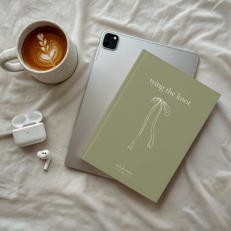 green and white personalized engagement journal with bow tying the knot coquette engagement party gift for bride wedding planner