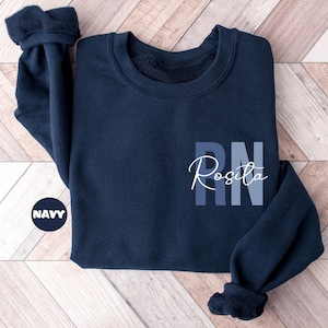 Custom Registered Nurse Sweatshirt With Name, Personalized RN Pocket Hoodie, Nurse Life Outfit, Nurse Appreciation Clothing, Cute Nurse Gift