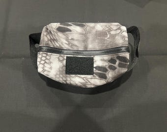 Neceser Kryptek Raid con un parche de regalo.