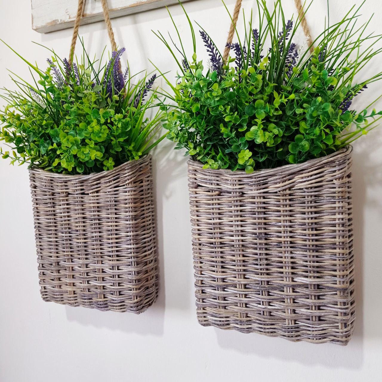 Gray wicker basket for flowers Door baskets in rustic style Hanging basket on the door Interior basket for the front door