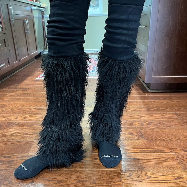 Black faux fur leg warmers.