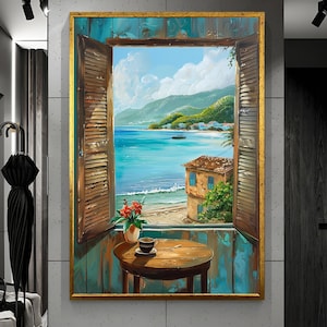 May include: A framed painting depicts a coastal scene viewed through an open window with wooden shutters. A small round table holds a coffee cup and a vase of red flowers. The ocean, beach, and mountains are visible in the background.