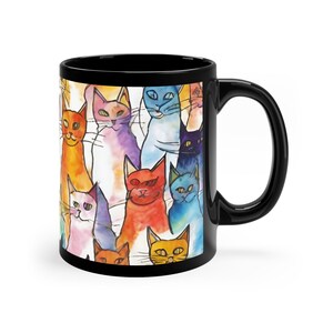 Coffee cup with cats in watercolor. watercolor cats on a mug