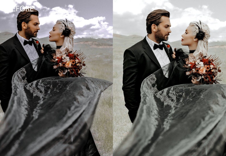 May include: A couple in black wedding attire stand in a field, the bride holding a bouquet of red and orange flowers. The bride's veil is flowing in the wind.