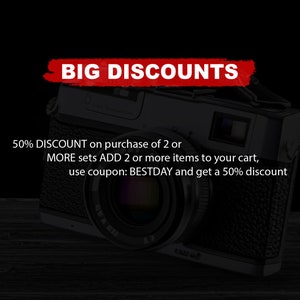 May include: A vintage camera with a black body and silver accents. The text "BIG DISCOUNTS" is written in red across the top of the image. The text below the camera reads "50% DISCOUNT on purchase of 2 or MORE sets ADD 2 or more items to your cart, use coupon: BESTDAY and get a 50% discount."