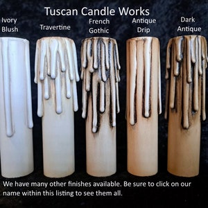 May include: Five different candle finishes are shown: Ivory Blush, Travertine, French Gothic, Antique Drip, and Dark Antique. The candles are all white with varying degrees of brown and black drippings.