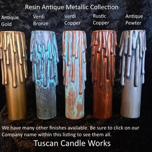 May include: Five resin candle pillars in different antique metallic finishes: antique gold, verdi bronze, verdi copper, rustic copper, and antique pewter.  Resin Antique Metallic Collection. Tuscan Candle Works.