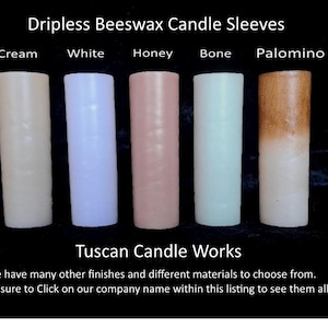 May include: Five beeswax candle sleeves in different colors: cream, white, honey, bone, and palomino. The sleeves are dripless and are labeled with their color names. The text "Dripless Beeswax Candle Sleeves" and "Tuscan Candle Works" is also visible.