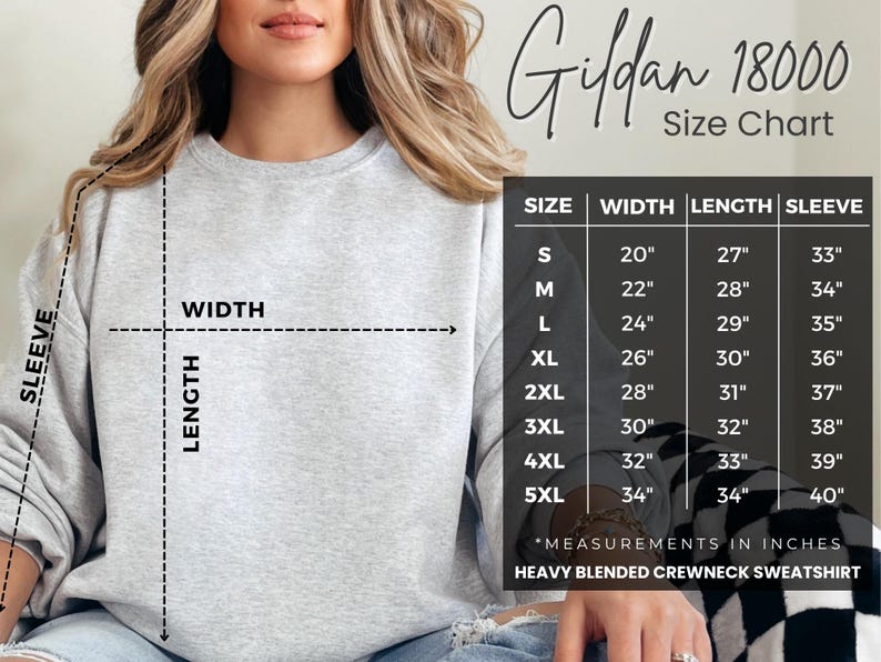 May include: Size chart for Gildan 18000 heavy blended crewneck sweatshirt. The chart shows measurements in inches for width, length, and sleeve length for sizes S through 5XL.